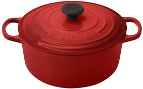 Red Le Creuset dutch oven with lid