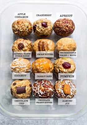 Top view of 12 healthy protein bites with text on a grey background