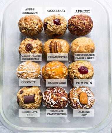 Top view of 12 healthy protein bites with text on a grey background