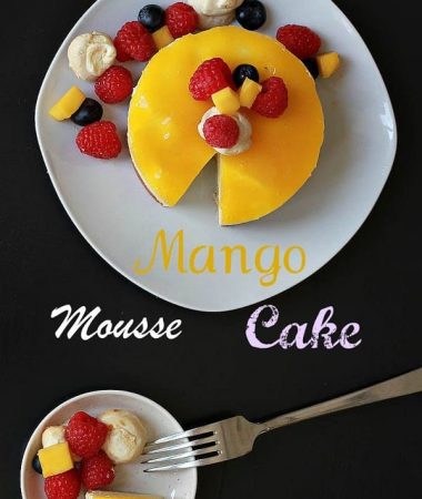 Overhead view of Mango Mousse Cake with fresh berries