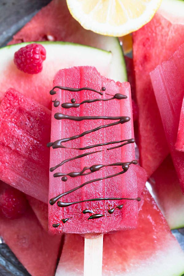 3 Ingredient Watermelon Raspberry Popsicles are the perfect easy frozen treat for summer. Best of all, only a few ingredients and super simple to customize. A delicious treat for kids to cool down on a hot summer day.