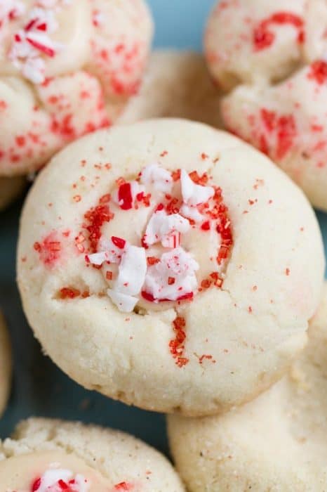 Shortbread Thumbprint cookies filled with white chocolate and crushed candy canes
