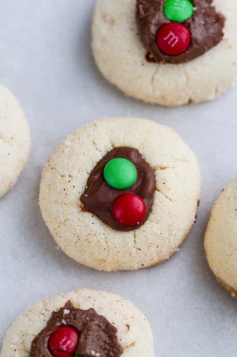 Shortbread Thumbprint Cookies filled with chocolate and M&Ms