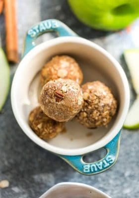 Apple Energy Bites - the perfect easy and healthy no bake snacks for on the go or after a workout! Best of all, no refined sugar and super easy to customize and make ahead for packing into school or work lunchboxes. Full of cozy fall and apple flavors with gluten free and nut free options.
