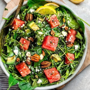 Overhead view of Arugula Watermelon Salad in a bowl