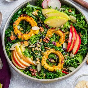 Top view of Autumn Harvest Salad in a bowl with apple and pear slices without chicken