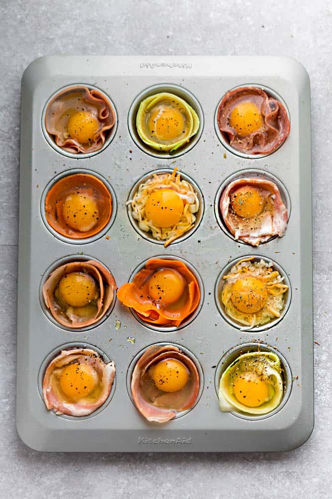 Baked Egg Cups - 9 Ways are the perfect low carb and protein packed breakfast. Best of all, they are super simple to customize and come together in less than 30 minutes!