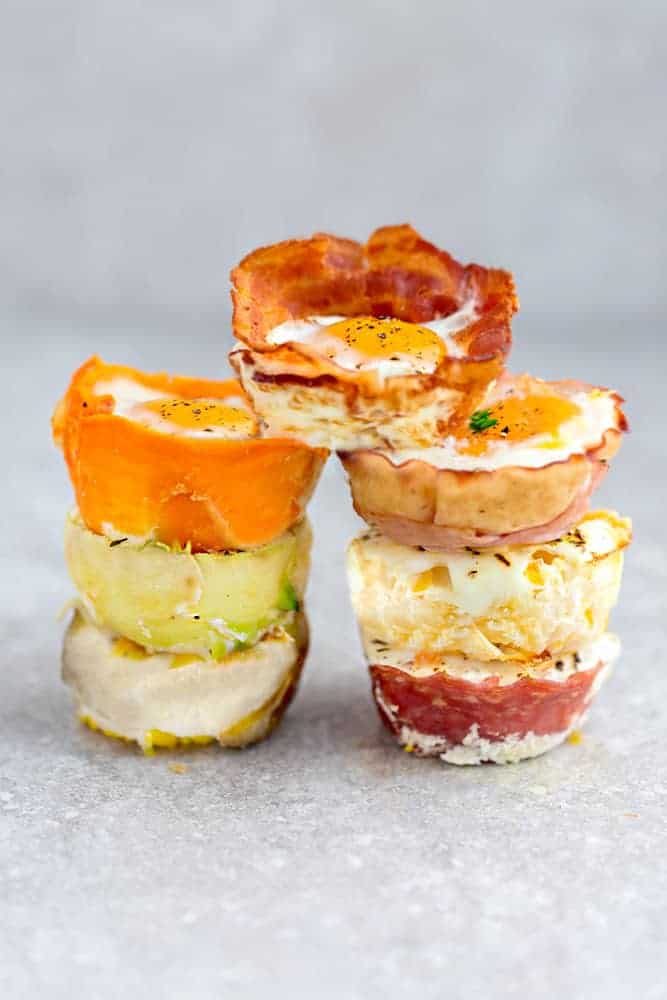 Baked Egg Cups - 9 Ways are the perfect low carb and protein packed breakfast. Best of all, they are super simple to customize and come together in less than 30 minutes!