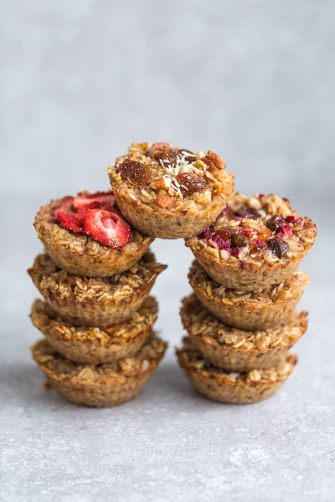 These baked oatmeal cups make the perfect easy and healthy make-ahead breakfast to enjoy throughout the week. Best of all, they're simple to customize and include recipes for 10 different ways to make them plus useful tips. Refined sugar free, gluten free and vegan. LEMON ALMOND POPPY SEED, STRAWBERRY, RASPBERRY CHOCOLATE CHIPS, PINEAPPLE COCONUT, HONEY WALNUT, ALMOND BUTTER & BANANA, PUMPKIN CRANBERRY & CARROT CAKE, CHOCOLATE CHUNK & APPLE CINNAMON