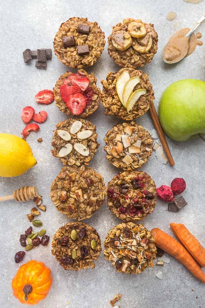 Two Rows of Baked Oatmeal Cookies With a Variety of Toppings