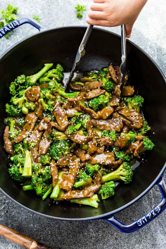 This Skinny Beef and Broccoli Stir-Fry makes the perfect easy weeknight dish full of authentic flavors. Best of all, it's so easy to make with authentic flavors and way better than your favorite Chinese takeout restaurant. Great for meal prep Sunday and leftovers can be used for work or school lunch bowls!