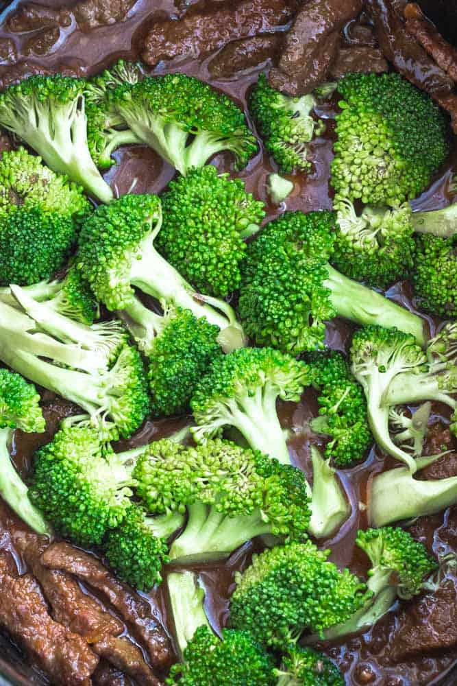 Instant Pot Beef and Broccoli - an easy set and forget Chinese takeout favorite perfect for busy weeknights. Best of all, the beef cooks up melt-in your mouth delicious in a rich and savory sauce. Recipe also works great for Sunday meal prep for work or school lunchboxes.