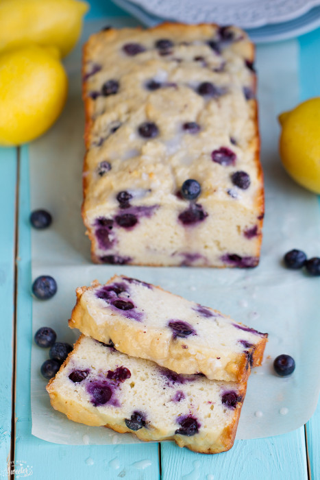 Berry Lemon Loaf Cake with a couple slices cut