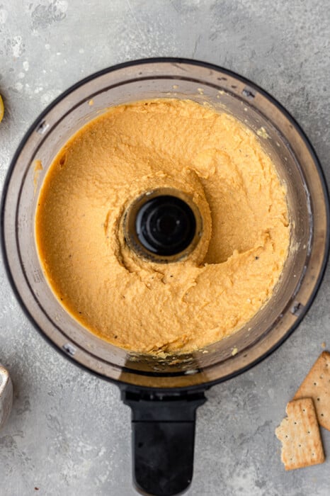 Creamy blended chickpeas in a food processor
