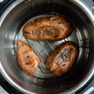 Top view of three baked sweet potatoes in an Instant Pot