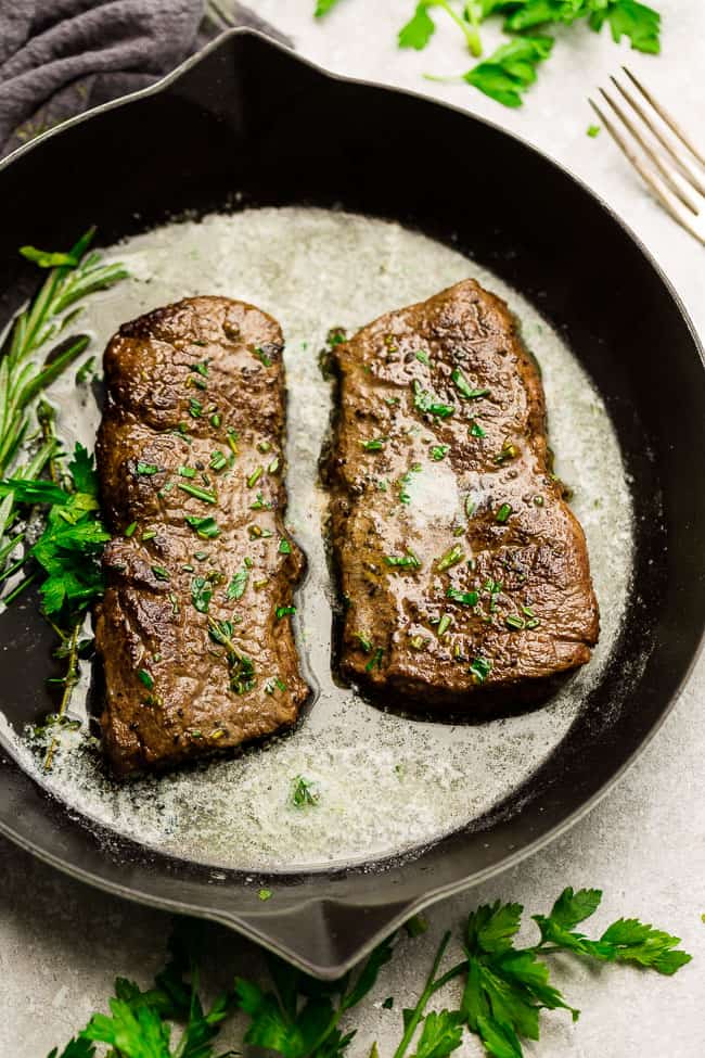 Garlic Steak with Herb Butter, Asparagus and Mushrooms - pan seared in a skillet plus "how to" tips to cook the best tender steak at home. This easy to customize recipe is also gluten free, low carb, paleo and keto friendly.