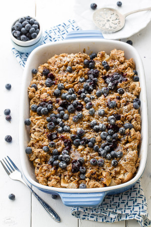 Overnight Blueberry Cream Cheese French Toast Bake - An easy and delicious baked French Toast bursting with blueberries and cream cheese. Perfect for breakfast, brunch or even dinner and best of all, so easy to assemble the night before!