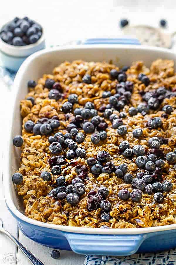 Overnight Blueberry Cream Cheese French Toast Casserole Bake - Super easy & delicious baked French Toast bursting with blueberries,cream cheese, brown sugar streusel and the BEST blueberry sauce. With gluten free and refined sugar free options. Make it the night before and pop it in the oven in the morning. Perfect for Mother's Day or any special breakfast, brunch or even dinner