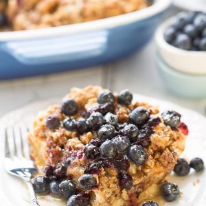 Overnight Blueberry Cream Cheese French Toast Bake - An easy and delicious baked French Toast bursting with blueberries and cream cheese. Perfect for breakfast, brunch or even dinner.
