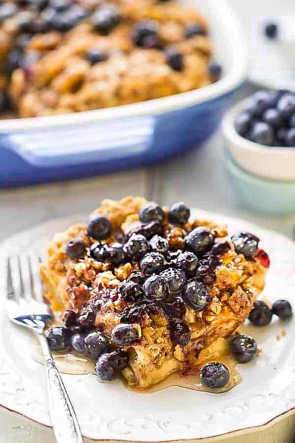 Overnight Blueberry Cream Cheese French Toast Casserole Bake - Super easy & delicious baked French Toast bursting with blueberries,cream cheese, brown sugar streusel and the BEST blueberry sauce. With gluten free and refined sugar free options. Make it the night before and pop it in the oven in the morning. Perfect for Mother's Day or any special breakfast, brunch or even dinner