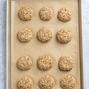Top view of unbaked breakfast cookies on a baking sheet