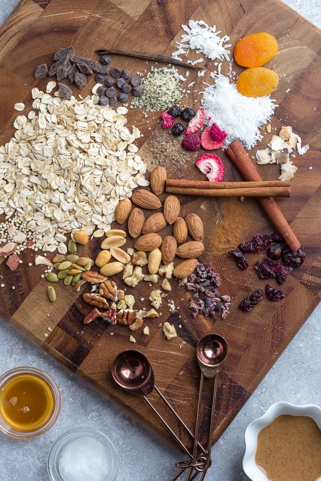 All of the Breakfast Cookie Ingredients Piled Onto a Wooden Cutting Board