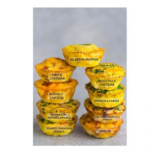 9 Different Flavored Breakfast Egg Muffin Cups stacked on top from the side view