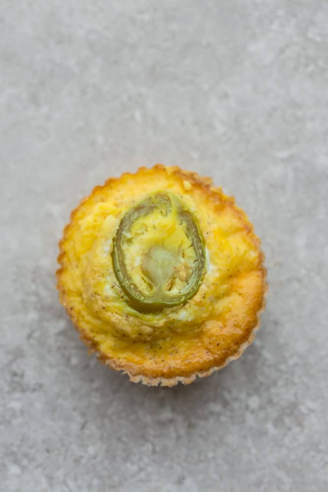 A Jalapeno Popper Egg Muffin on a Countertop Shot From Above