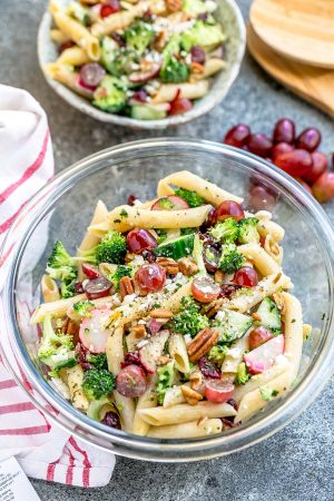 Broccoli Pasta Salad with grapes and pecans the perfect side dish to bring to summer potlucks, parties, Memorial Day / Fourth of July grillouts/barbecues. Best of all, it's so easy to make and easy to customize with your favorite toppings and homemade dressing. Perfect for Sunday meal prep and leftovers are delicious for school or work lunchboxes or lunchbowls.