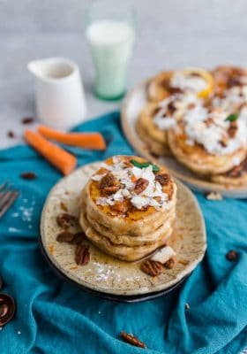 These Carrot Cake Pancakes perfect or any spring breakfast or Easter brunch. Best of all, they’re low carb and have all the classic flavors you love about the popular cake. It's like having dessert for breakfast Keto-friendly ingredients. Grain free, sugar free and made with coconut, carrots, pecans and cream cheese.