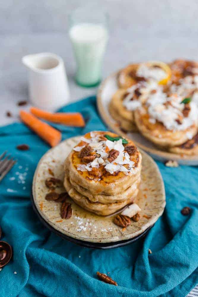 These Carrot Cake Pancakes perfect or any spring breakfast or Easter brunch. Best of all, they’re low carb and have all the classic flavors you love about the popular cake. It's like having dessert for breakfast Keto-friendly ingredients. Grain free, sugar free and made with coconut, carrots, pecans and cream cheese.
