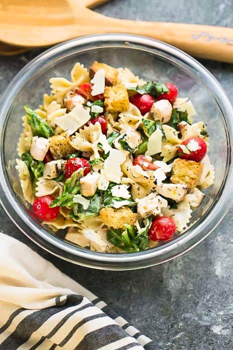 Chicken Caesar Pasta Salad - the perfect side dish to bring to summer potlucks, parties, Memorial Day / Fourth of July grillouts/barbecues. Best of all, it's so easy to make and has all the classic flavors of a caesar salad. Perfect for Sunday meal prep and leftovers are delicious for school or work lunchboxes or lunchbowls.