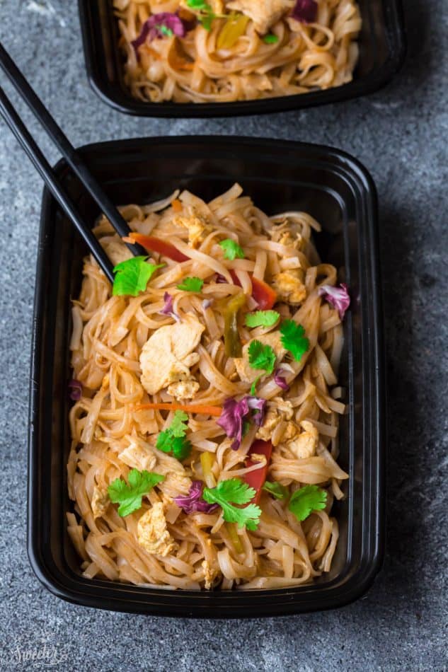 Easy and Authentic Chicken Pad Thai recipe in two meal prepping bowls with black chopsticks.