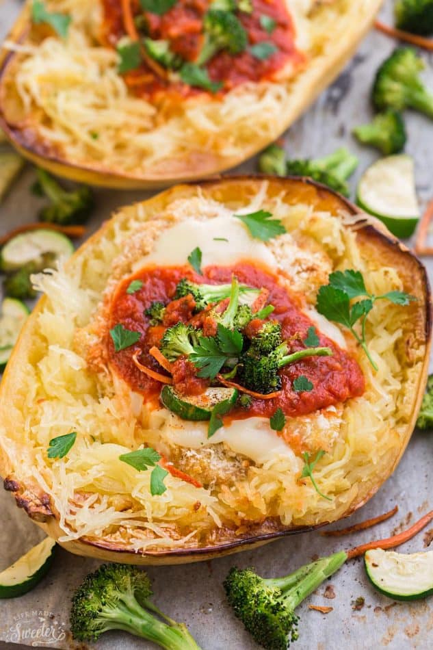 Chicken Parmesan Spaghetti Squash Bowls make the perfect easy one pan meal. Best of all, it's so easy to customize with your favorite veggies and takes just 15 minutes of prep time!