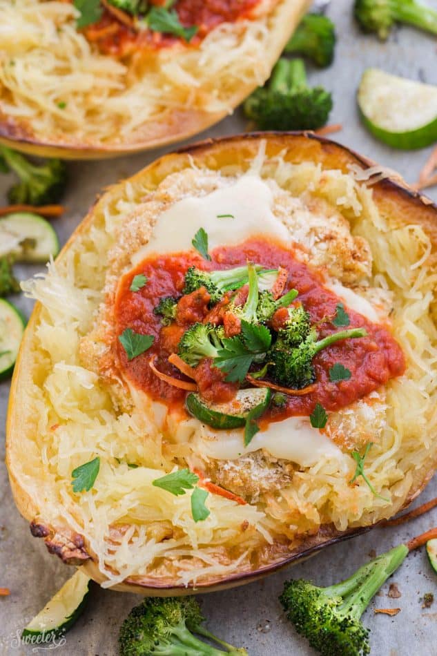 Chicken Parmesan Spaghetti Squash Bowls make the perfect easy one pan meal. Best of all, it's so easy to customize with your favorite veggies and takes just 15 minutes of prep time!