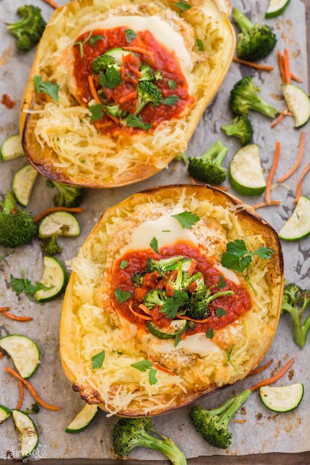 Chicken Parmesan Spaghetti Squash Bowls make the perfect easy one pan meal. Best of all, it's so easy to customize with your favorite veggies and takes just 15 minutes of prep time!