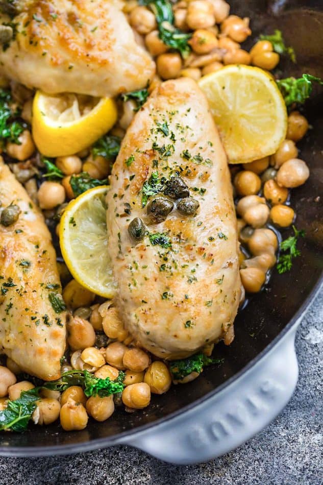 This recipe for Chicken Piccata with Chickpeas is the perfect easy protein-packed meal for busy weeknights or impressive enought for date night. Best of all, comes together in just 30 minutes with a tangy lemon sauce with capers. Great for Sunday meal prep for packing into school or work lunchboxes or lunch bowls.