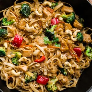 Easy Chicken Stir Fry Noodles is the perfect recipe for busy weeknights. Best of all, this dish is simple to customize with any leftover protein and vegetables and takes less than 30 minutes to make.