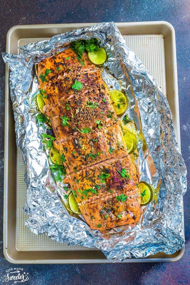 Chili Lime Salmon baked in foil on one sheet pan is fresh, flavorful and super delicious! Best of all, this recipe comes together in less than 30 minutes with tangy lime, chili powder and fresh parsley. The perfect weeknight meal!