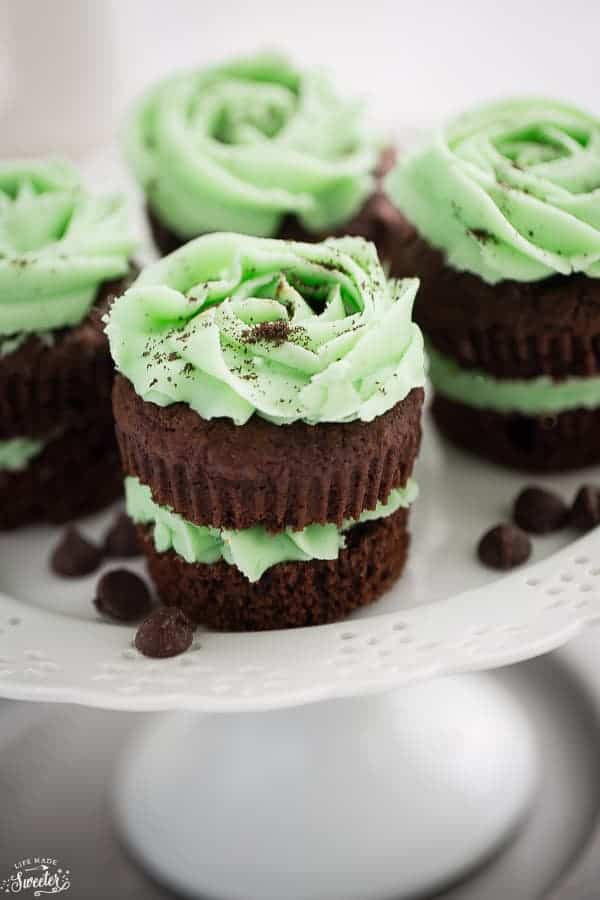 Chocolate Mint sandwich Cupcakes on a white cake stand