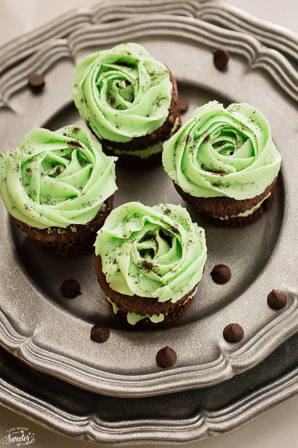 Overhead view of 4 Chocolate Mint Cupcakes on a metal plate