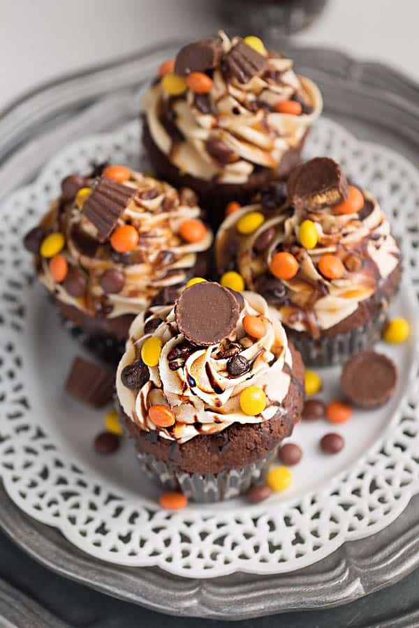 Top view of Reese's Peanut Butter Cup Chocolate Cupcakes on a plate