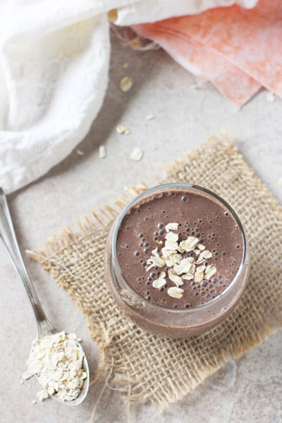 overhead view of Chocolate Cherry Oat smoothie in a glass