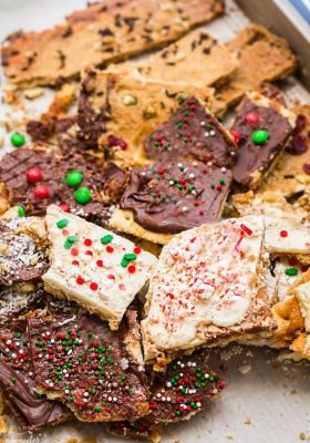 Christmas Cracker Toffee - 7 Ways with Saltine & Graham Crackers makes an easy and addictive treat perfect for the holidays! Best of all, takes as little as 4 ingredients and SUPER EASY to customize!