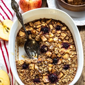 Close-up top view of Apple Baked Oatmeal in a white casserole dish