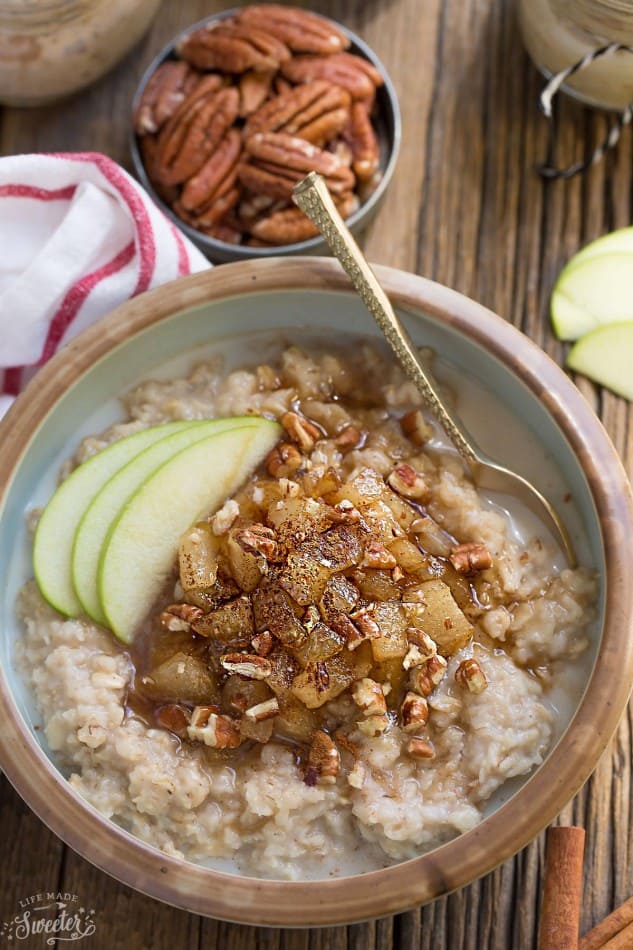 Top view of cinnamon applie oatmeal in cream bowl.