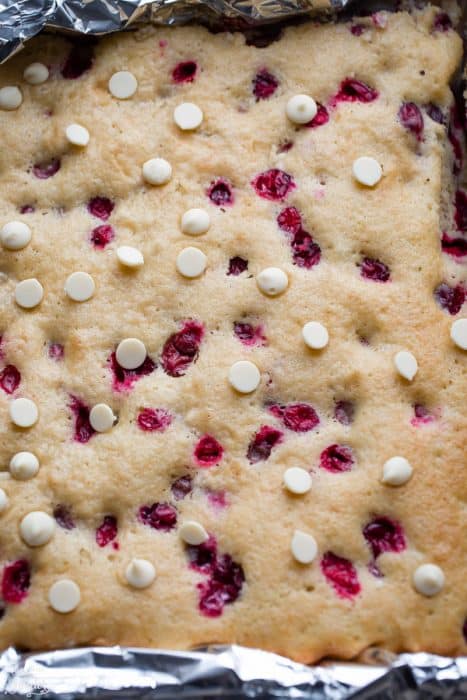 Top view of baked cranberry coffee cake in a cake pan