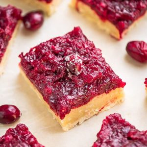 Close-up view of healthy cranberry bars on a white background