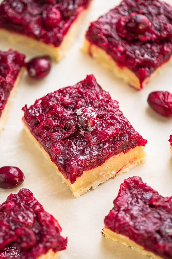 Close-up view of healthy cranberry bars on a white background