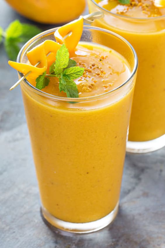 Mango smoothie in tall glasses